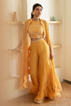 Shop for Mani Bhatia Yellow Silk Organza Embroidered Cape And Gharara Set for Women Online at Aza Fashions Yellow Sharara Set, Open Crop Top, Yellow Sharara, Haldi Dress, Sharara Designs, Cape Set, Haldi Outfits, Function Dresses, Trendy Outfits Indian