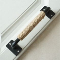 a door handle with a rope attached to it