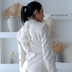 ✔Beige blazer embellished with ornaments and beads. Every single detail is hand-finished and firmly sewn. ✔High quality material. Solid, fine fabric sits perfectly on the body and cuts a beautiful figure. Discover the timeless elegance of a handmade white blazer with embroidery and beads! Every single detail of this exquisite creation has been carefully crafted to offer you unparalleled luxury and... to offer irresistible style. Care 👉 Hand wash Danger! No Return Since it is a one-of-a-kind ite Blazer With Embroidery, Formal Jacket, Belle Silhouette, Elegant Blazers, Beige Blazer, Blazer Beige, Winter Formal, Beautiful Figure, Classic Blazer