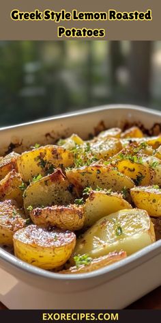 greek style lemon roasted potatoes in a casserole dish