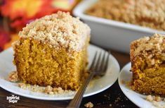 two white plates with slices of pumpkin coffee cake on them and a fork next to the plate