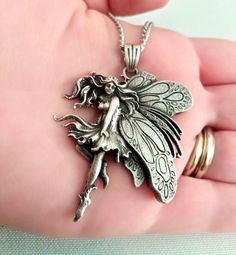 ★ Fairy Pendant ★ A beautiful handcrafted Fairy Pendant for Men and Women. * Materials/Finishes ➤ Artificially Aged (Black/Grey Oxidized) Silver 925 * Dimensions ➤ 5.1 x 4.2 x 0.7 cm (~ 2.0 x 1.6 x 0.3 inches)/Suitable for up to 3.0 mm (~ 0.1 inches) Chain * Weight: ~ 17 grams ----------------------------------------------------------------------------- IMPORTANT NOTES: ----------------------------------------------------------------------------- ➤ When buying from Gold and Silver Designs you wi Handmade Silver Fairycore Jewelry, Silver Fairy Grunge Necklace As A Gift, Silver Fairy Grunge Necklace For Gift, Silver Pendant Necklace Fairycore Style, Silver Pendant Necklace In Fairycore Style, Handmade Fairy Grunge Jewelry As Gift, Handmade Fairy Grunge Jewelry For Gifts, Handmade Fairy Grunge Jewelry Gift, Fairy Grunge Handmade Jewelry For Gifts