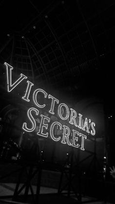 the victoria's secret sign is lit up in black and white