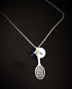 Do you or your friend love to play tennis? If your answer is yes, then this necklace is for you! This necklace will have your recipient's hand stamped initial and tennis racket charm! A glass birthstone bead is also added.  Please let me know the initial during checkout in the instructions to seller section. Tennis Coach Gift, Tennis Jewelry, Tennis Gifts, Sports Jewelry, Senior Gifts, Lovers Necklace, Play Tennis, Monogram Necklace, Tennis Player