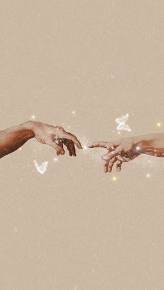 two hands reaching out towards each other in front of a beige background with white stars