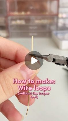 someone is cutting wire with a pair of scissors