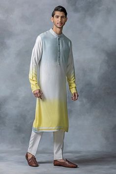 Yellow full sleeve ombre kurta with mandarin collared neckline. Paired with pant.
Components: 2
Type Of Work: Plain
Neckline: Mandarin collar
Sleeve Type: Full sleeves
Fabric: Moss Crepe
Color: Yellow
Other Details: 
Front button detailing
Cuff sleeve hem
Occasion: Mehendi and Puja - Aza Fashions Wedding Dress For Boys, India Fashion Men, Sherwani For Men Wedding, Indian Groom Wear, Gents Kurta Design, Gents Kurta, Sherwani For Men, Kurta Men, Kurta Pant Set