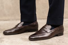 Stylish and exceptionally comfortable, our penny loafer is one of the most versatile shoes around. Runs full size large (order full size down from regular US dress shoe size). For example, if you normally wear a size US 10 dress shoe, order a size 9 Alternatively, order one and a half sizes below your Brannock device measurement. For example, if you measure a 10 on the Brannock, order a size 8.5 Full-grain Italian calfskin leather upper Matching leather sole Black interior leather lining Blake c Versatile Shoes, Brown Chocolate, Penny Loafer, Dress Shoe, Penny Loafers, Black Interior, Loafers Men, Calf Skin, Penny