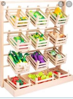 a wooden rack filled with different types of fruits and vegetables