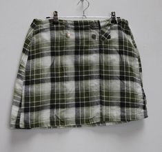 "a vintage green and white plaid mini-skirt ✿ IMPORTANT INFORMATION: * excellent vintage condition * material: 100% cotton * size: large - please check exact measurements below (they're there for your benefit!) * garment care: machine washable ✿ MEASUREMENTS (taken while item is lying flat, some measurements will need to be doubled): * length: 16\" (41cm) * waist: 15\" (38cm) * hips: 19.5\" (50cm) ✿ free UK shipping on orders over £100 with code STRAWBERRY free international shipping on orders o Plaid Mini Skort For School, Plaid Skort For School, Plaid Cotton Mini Skort, Plaid Cotton Mini Skirt Skort, Preppy Green Cotton Skort, Green Mini Length Fall Skort, Retro Green Mini Length Skort, Preppy Green Lined Mini Skirt, Preppy Green Lined Skort