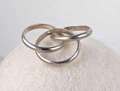 "A simplistic but meaningful Trinity Ring constructed by three interlocked silver bands. Trinity rings symbolize love, friendship and fidelity. They make wonderful engagement or wedding bands. The ring is marked \"925\" for sterling silver on the back. It is in great condition. This ring is size 5 . (This ring is properly sized, please make sure that you purchase it according to your size. Returns based on lack of fitting will not be accepted.)" Micro Mosaic Jewelry, Double Rings, Trinity Ring, Wedding Women, Friendship Rings, Engagement Ring Vintage, Mid Century Jewelry, Italian Jewelry, Double Ring