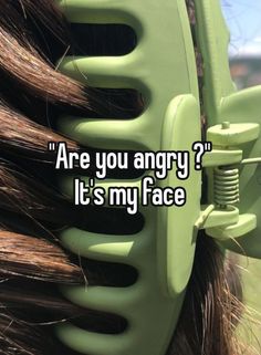 a close up of a hair brush with the words are you angry? it's my face