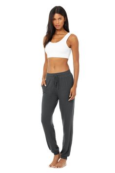 Warning: once you’re in these, you’ll never, ever want to take them off. The Soho Sweatpant is made from our super-soft, cashmere-like Alolux performance fabric for an elevated look for to & from or post-practice recovery. Seriously snuggly & breathable, with front patch pockets & a drawstring waistband — pairs perfectly with any Alolux look. Soft & cozy with a vintage, lived-in look Side & back pockets Designed & uniquely fit to flatter every size Wear-tested by our in-h Fall Ties, Woman Back, Back Women, Gym Shorts, Shopper Tote, Alo Yoga, Performance Fabric, Drawstring Waistband, Bra Tops