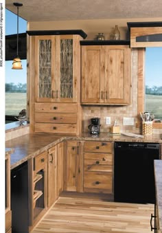 a kitchen with wooden cabinets and black appliances