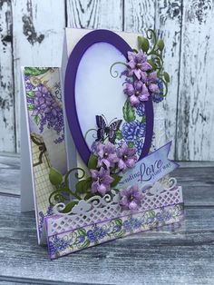 a card that has purple flowers on it