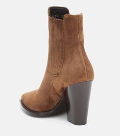 Find SAINT LAURENT Theo 95 Suede Ankle Boots on Editorialist. Lining: leather. Upper: calf leather. Sole: leather insole and sole. Toe shape: almond toe. Made in Italy. Designer color name: Land. Closure: elasticated sides.