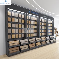 the display case is full of different types of wood flooring in an empty room