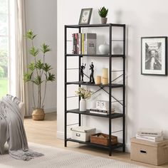 a black book shelf in a living room