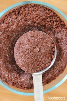 chocolate cake mix in a glass bowl with a spoon