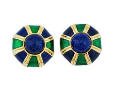 A pair of elegant vintage clip on earrings by Ciner. Those round gold plated earrings feature geometric designs decorated with dark blue and green enamel stripes, and set with round blue cabochons imitating lapis lazuli stones to the center. Marked on the clasp, Ciner. Vintage and Modern Ladies Costume Jewelry Wares and Accessories For Collectors. Dimensions: D 1 1/4 in. All measurements are approximate. Condition Overall good vintage condition. Signs of age and wear. Refer to photos. Vintage Yellow Gold Clip-on Earrings With Cabochon, Luxury Yellow Gold Vintage Clip-on Earrings, Luxury Vintage Enamel Clip-on Earrings, Luxury Vintage Cabochon Clip-on Earrings, Vintage Clip On Earrings, Vintage Gold Clip-on Earrings With Black Enamel, Lapis Lazuli Stone, Vintage Clip, Green Enamel