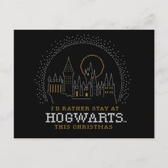 the hogwarts christmas card is shown in black with gold and white lettering on it