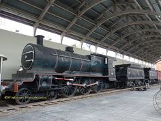 an old fashioned train is on display at the museum