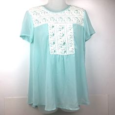 Sweet And Feminine Sheer Aqua Blouse Flowy Tunic Style, Has Nice Lace Embellishments Size S. Excellent Condition Nwt Casual Summer Blouse With Lace Patchwork, Summer Lace Patchwork Short Sleeve Blouse, Summer Short Sleeve Blouse With Lace Patchwork, Summer Blouse With Lace Patchwork And Short Sleeves, Casual Lace Patchwork Blouse For Spring, Spring Lace Patchwork Tops For Day Out, Spring Vacation Tops With Lace Patchwork, Summer Lace Blouse With Crew Neck, Casual Lace Patchwork Blouse For Vacation