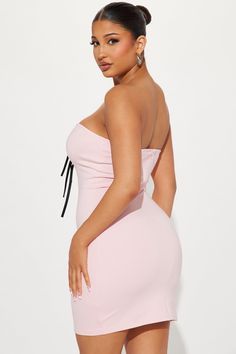 Available In Pink. Mini Dress Strapless Straight Neckline Tie Front Hidden Back Zipper Stretch Length = 33" Self 62% Viscose 33% Nylon 5% Spandex Contrast 95% Polyester 5% Spandex Imported | Brielle Bow Mini Dress in Pink size 3X by Fashion Nova Pink Strapless Dress With Built-in Bra, Stretch Strapless Bandage Dress, Pink Stretch Bandeau Dress, Spring Strapless Bandage Bodycon Dress, Strapless Bodycon Dress With Built-in Bra, Spring Strapless Bodycon Dress With Built-in Bra, Mini Dress Strapless, Bow Mini Dress, Pink Mini Dress