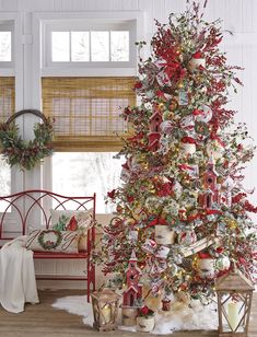 a decorated christmas tree in a living room