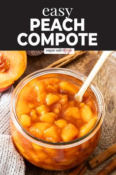 a glass jar filled with peach compote next to cinnamon sticks