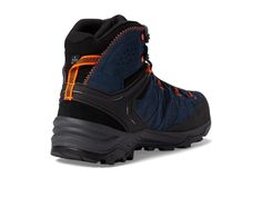 a pair of black and orange hiking boots