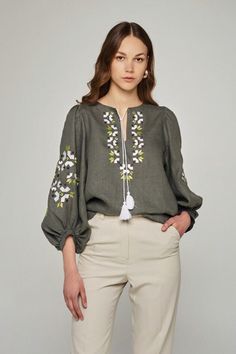 🌷Elevate your wardrobe with our Olive Linen Embroidered Blouse, a perfect blend of comfort and style. This beautifully crafted peasant blouse features delicate embroidery and charming puff sleeves, making it an ideal choice for both casual outings and special occasions.  Made from high-quality linen, this top is breathable and lightweight, ensuring you stay cool and stylish during warmer months. Embrace eco-friendly fashion with our handmade linen clothing, designed for the modern woman who val Folk Style Blouse With Tonal Embroidery For Spring, Spring Floral Embroidery Blouse With Bishop Sleeves, Spring Embroidered Blouse With Balloon Sleeves, Spring Bishop Sleeve Blouse With Floral Embroidery, Spring Floral Embroidered Blouse With Bishop Sleeves, Spring Peasant Top With Balloon Sleeves, Spring Embroidered Balloon Sleeve Blouse, Green Embroidered Hem Blouse For Spring, Spring Green Blouse With Embroidered Hem