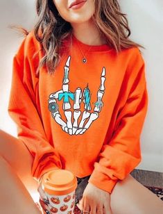 Unisex fit crew neck sweatshirt 50% cotton 50% polyester ••Holiday & seasonal items are FINAL SALE•• Orange Letter Print Crew Neck Hoodie, Orange Long Sleeve Sweatshirt For Winter, Orange Letter Print Sweatshirt For Winter, Orange Ribbed Cuffs Sweatshirt For Fall, Trendy Orange Sweatshirt For Fall, Orange Crew Neck Top For Fall, Trendy Orange Crew Neck Sweater, Winter Orange Streetwear Tops, Orange Long Sleeve Cotton Sweater