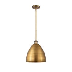 a brass colored pendant light hanging from the ceiling with an open end and one light on it