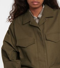 Find TOTÊME Cotton Cargo Jacket on Editorialist. Lining: 100% cotton, fully lined. Closure: concealed buttoned front. Designer color name: Khaki Green. Buttoned cuffs. Pockets: flap pockets, breast pockets. Care instructions: dry clean. Material: 100% cotton. Olive Cotton Outerwear For Fall, Olive Cotton Utility Jacket For Fall, Olive Cotton Outerwear With Flap Pockets, Olive Cotton Outerwear With Patch Pockets, Olive Cotton Outerwear With Pockets, Olive Cotton Outerwear For Spring, Spring Cotton Olive Outerwear, Green Cotton Outerwear With Side Pockets, Olive Cotton Outerwear With Button Closure