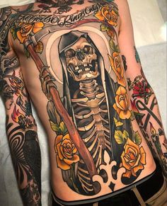 a woman with a skeleton tattoo on her stomach and holding a knife in one hand