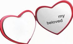 two heart shaped magnets with the words my beloved written on them