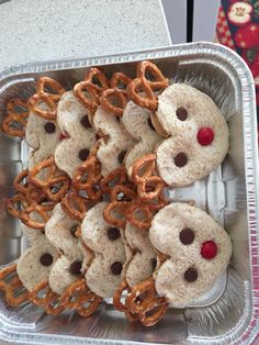 some pretzels and other snacks are in a tray