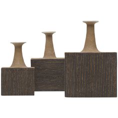 three brown vases sitting next to each other on a white background with no one in the photo