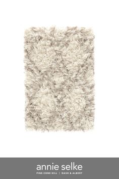 an image of a white rug with the words annie selke on it