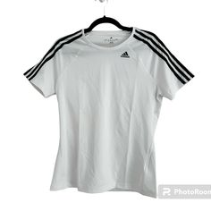 Nwt Adidas Climalite Tshirt. Brand New Never Worn. Size Medium Sporty White Breathable T-shirt, Adidas Crew Neck Running T-shirt, White Adidas Workout T-shirt, White Breathable Sportswear T-shirt, White Breathable T-shirt For Athleisure, White Breathable Athleisure T-shirt, White Short Sleeve T-shirt For Light Sports, White Moisture-wicking T-shirt For Running, White Athletic Fit T-shirt For Workout