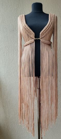 Long Summer Dress With Fringe, Long Maxi Dress With Tassels For Beach, Long Maxi Dress With Tassels For Beach Cover-up, Long Tassel Maxi Dress For Beach, Maxi Beach Cover-up Dress With Tassels, Long Tassel Maxi Dress For Beach Cover-up, Long Dresses With Tassel Ties, Beige Bohemian Party Dress, Long Beige Party Dress