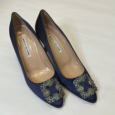 Manolo Blahnik Pumps Blue Satin Leather Trim Round-Toes With Crystal Embellishments Runs Narrow 70mm Heel Never Worn, Mint Condition Comes With Dust Bags But No Shoe Box Elegant Fitted Heels For Galas, Embellished Shoe Clips For Evening, Designer Blue Heels For Wedding, Elegant Silk Heels Fitted, Elegant Silk Heels For Cocktail Events, Elegant Silk Heels For Cocktail, Elegant Almond Toe Shoe Clips For Evening, Embellished High Heel Shoe Clips For Formal Events, Chic Embellished Shoe Clips For Formal Occasions