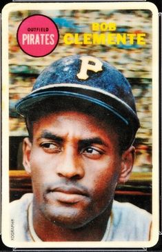 a baseball card with a man wearing a hat on it's head and looking at the camera