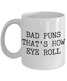 a white coffee mug with the words bad puns that's how eye roll