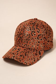 This ball cap is for ladies that love soft materials, leopard print and gold. Our unique hat accessory is made from a soft tan material and has leopard prints through the cap. To top if off, there are shiny gold accents to highlight your style. Size • Cap is adjustable. One size fits most• Length: 10.5 in (26.67 cm) • Width: 7 in (17.8 cm)• Height: 5.5 in (14 cm) Quality Cap made from 100% polyester blend ImportedHTC2658 Trendy Brown Baseball Cap With Curved Visor, Trendy Gold Snapback Hat, Trendy Gold Baseball Cap With Curved Brim, Trendy Adjustable Gold Baseball Cap, Trendy Gold Snapback Baseball Cap, Trendy Gold Baseball Cap One Size, Trendy Gold Baseball Cap, Adjustable Gold Visor Hat, Gold One Size Fits Most Baseball Cap