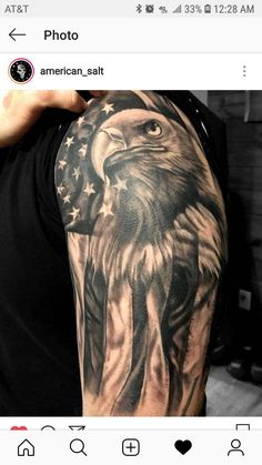 an eagle with the american flag on it's arm is shown in black and white