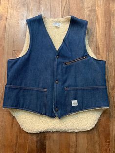 "Awesome vintage snap front vest with three front pockets (2 patch,  1 zip closure) and longer length in back. From what Madewell used to be, before it became what it is now, both of which I love! Laid flat it measures- Shoulder 14\" Pit to pit 22\" Waist 22\" Front length 23\" Back length 26\" Please ask any questions prior to purchase and see all photos, all sales are final, thank you!!" Cotton Medium Wash Vest Outerwear, Medium Wash Cotton Vest With Pockets, Dark Wash Cotton Vest With Pockets, Vintage Vest With Pockets In Dark Wash, Sherpa Vest, Mens Vests, Vest Outfits, Vintage Western, Etsy Vintage