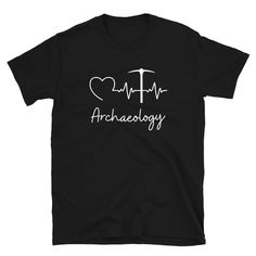 Archaeology is a Way of Living! Perfect gift for every Archaeologist! This tee feels super soft and lightweight, with the right amount of stretch. It's made from 100% cotton and it's comfortable and flattering for both men and women. You can find the Size Chart in the images above.  WHY BUY FROM US  All designs are made with love! We pride ourselves on our quality! We want you to love your items from us. Don't hesitate to contact us with any questions you may have. We are more than happy to help! For the fastest delivery and highest product quality, all US orders are fulfilled and shipped from Printful's fulfillment centers in Los Angeles, CA, and Charlotte, NC. Orders from Europe are fulfilled and shipped from Printful's office in Riga, Latvia. Student Humor, Riga, Charlotte Nc, Archaeology, Shirt Price, Love Your, Want You, Favorite Outfit, Arch