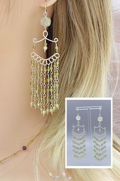 Embrace boho chic with these enchanting wire wrapped peridot drop earrings. The crystal beads add a hint of sparkle, making them the perfect accessory for any occasion. #BohoJewelry #HandcraftedEarrings #WireWrappedEarrings #GemstoneJewelry #UniqueGifts #LongDropEarrings #BohoStyle #CrystalBeads Earrings Boho Chic, Boho Earring, Peridot Earrings, Long Drop Earrings, Wire Wrapped Earrings, Handcrafted Earrings, Earrings Boho, Boho Earrings, Boho Jewelry